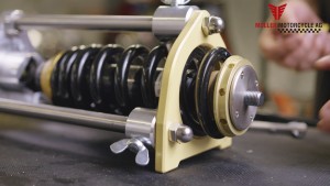 Shock strut press for assembly of lowering kit