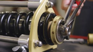 Shock strut press for assembly of lowering kit