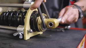 Shock strut press for assembly of lowering kit