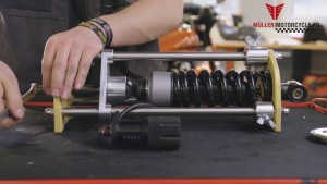 Shock strut press for assembly of lowering kit
